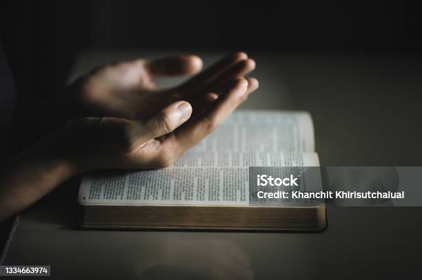 Women Pray From God Blessing To Have A Better Life Women Hands Praying To God With The Bible Believe Stock Photo - Download Image Now