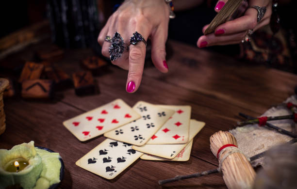 istock Gypsy fortune teller predicts the future with cards 1334665001
