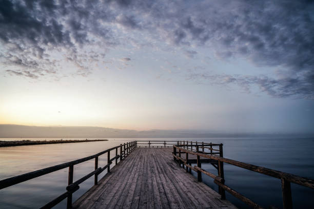 istock Landscape at sunrise of a jetty 1334665036