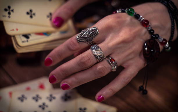 istock Gypsy fortune teller predicts the future with cards 1334665044