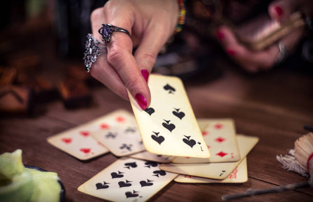istock Gypsy fortune teller predicts the future with cards 1334665047