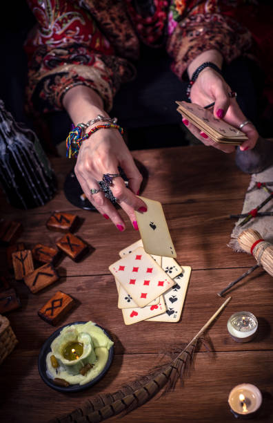 istock Gypsy fortune teller predicts the future with cards 1334665074
