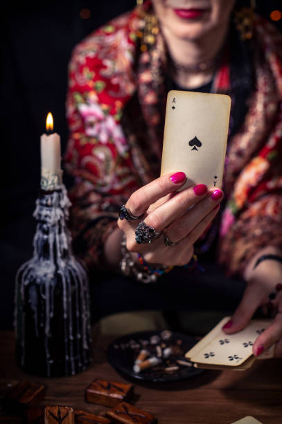 istock Gypsy fortune teller predicts the future with cards 1334665079