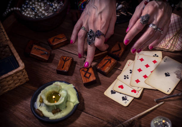 istock Gypsy fortune teller predicts the future with cards 1334665092