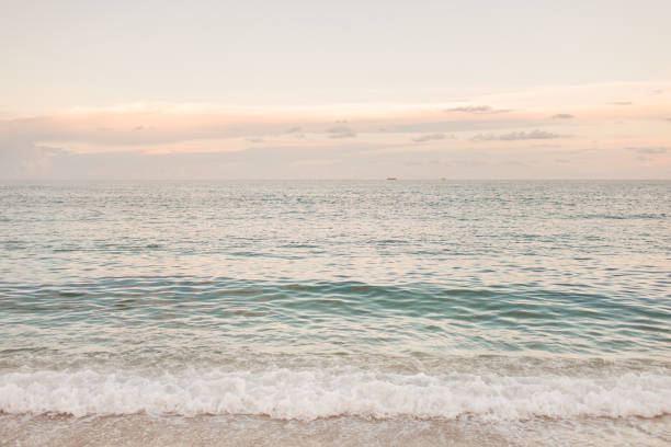 Ocean Waves in pastel colors on the water along the shoreline