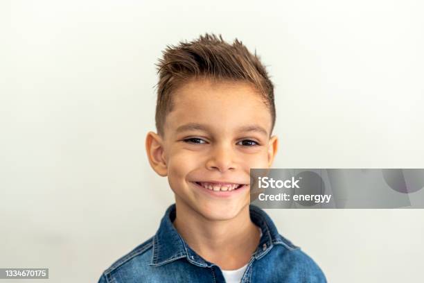 8 Years Old Little Boy With A Happy Cute Smiling Face Stock Photo -  Download Image Now - iStock