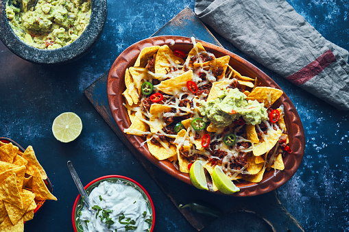 Nachos with Minced Meat, Hot Salsa and Guacamole
