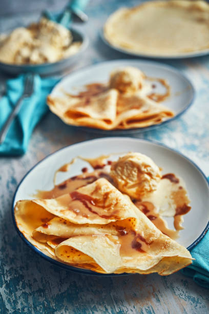 Crepe with Caramel and Dulce de Leche Crepe with Caramel and Dulce de Leche crepe stock pictures, royalty-free photos & images