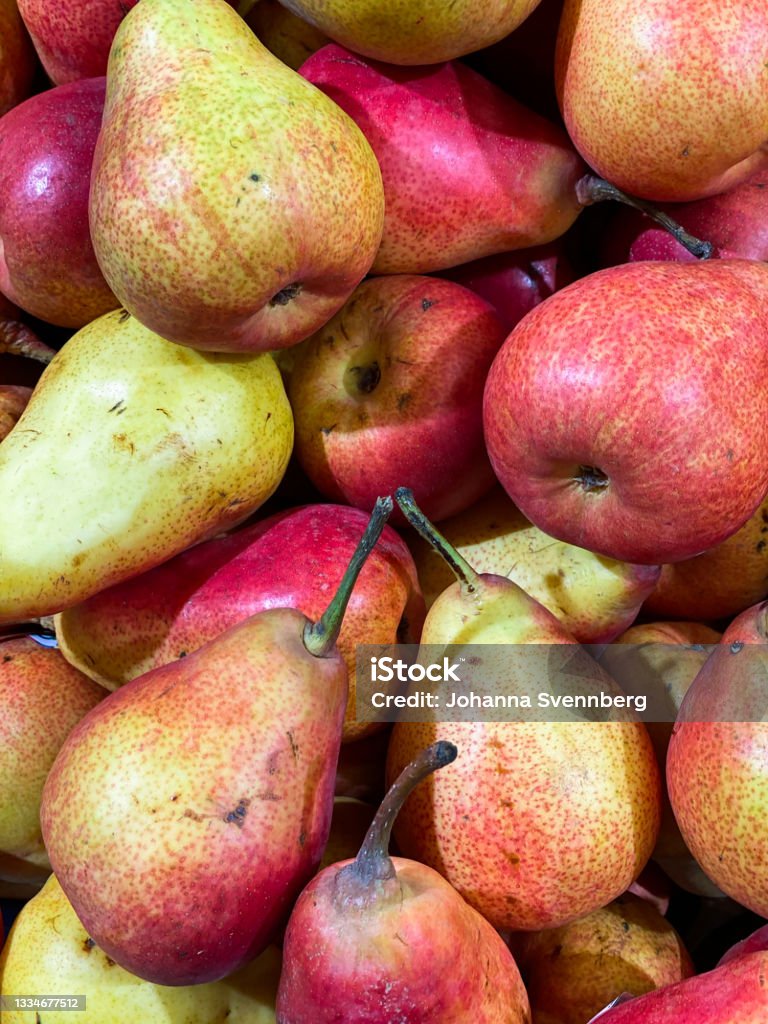 Forelle pears for sale in supermarket or farmers market Forelle pears for sale in supermarket or farmers market. Red pear. Aisle Stock Photo