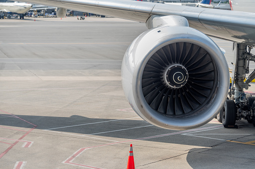 Close-up of the engine of an airplane.