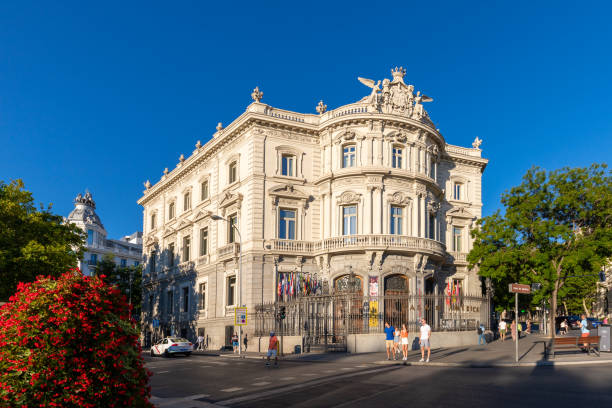 casa de america, the building is neo-baroque in style and french in inspiration. the façade is outstanding and spectacular with three entrance doors crowned by balconies - casa de america madrid stockfoto's en -beelden