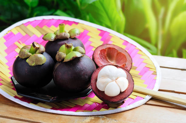 istock fresh mangosteen from the garden ready to eat,  selective focus 1334681721