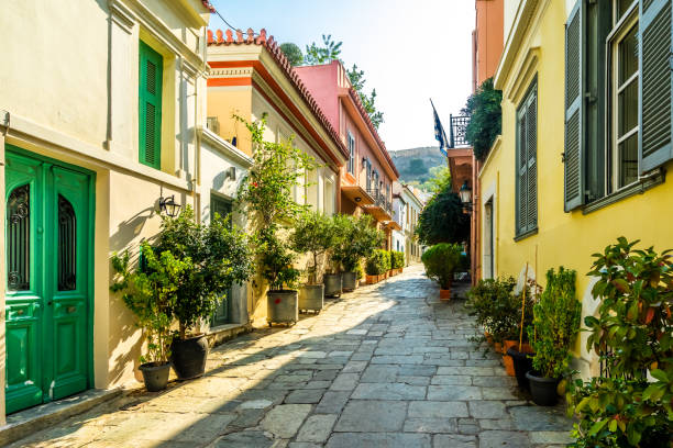 Buildings in the district of Plaka in Athens by the Acropolis View on buildings in the district of Plaka in Athens by the Acropolis plaka athens stock pictures, royalty-free photos & images