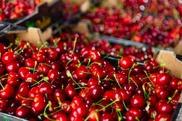 istock Fresh cherry on counter in supermarket 1334687006