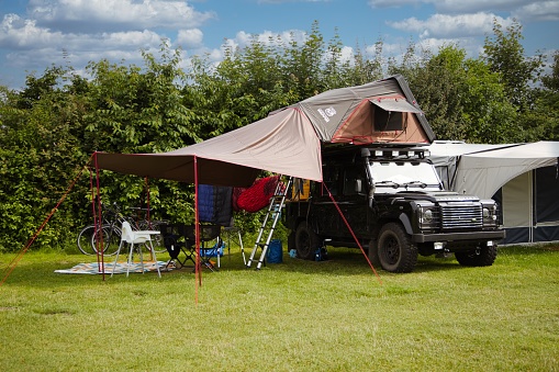 Sehlendorf, Schleswig-Holstein, Germany, Roof tent on a land rover, camping site, Range Rover
