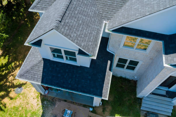istock Rooftop in a newly home constructed showing asphalt shingles multiple roof lines 1334689335