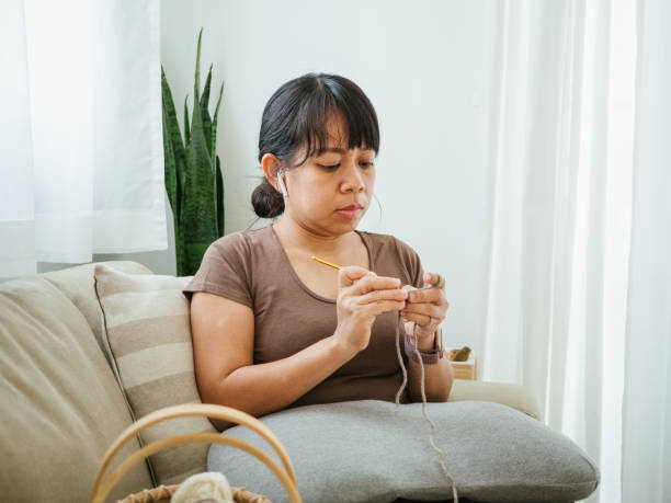 istock Women knitting knit craft. 1334694811