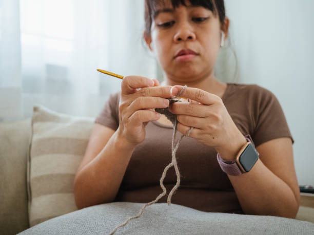 istock Woman doing crochet knits. 1334694838