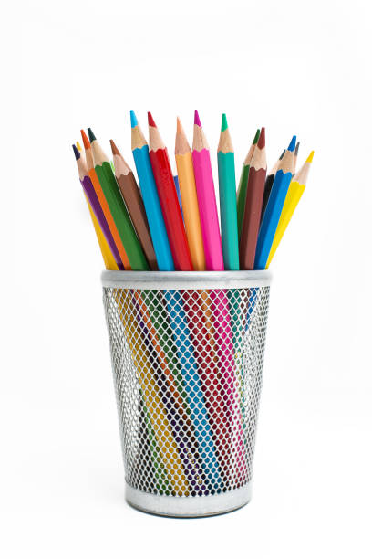 istock Colored pencils in a pencil case on white background 1334695701