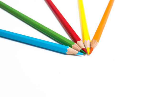 Colored pencils on white background stock photo