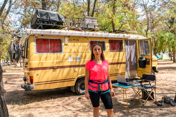 istock woman posing for camera on caravan trip 1334695960