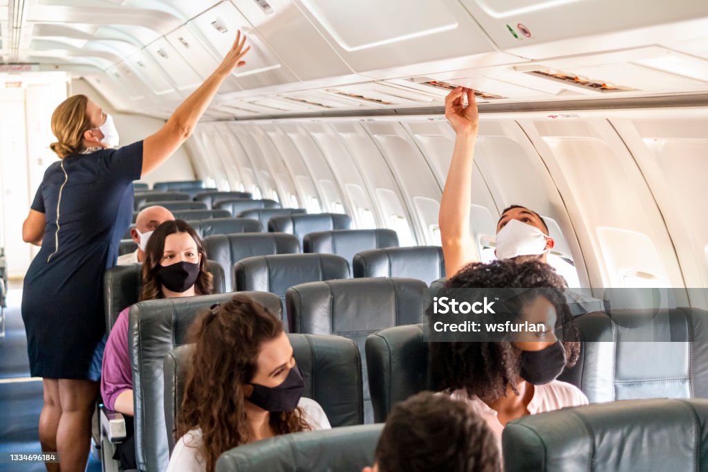 Passengers flying Photo of passengers flying Airplane Stock Photo