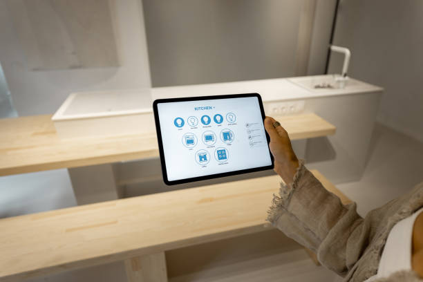istock Digital tablet with running mobile application for smart home 1334696279