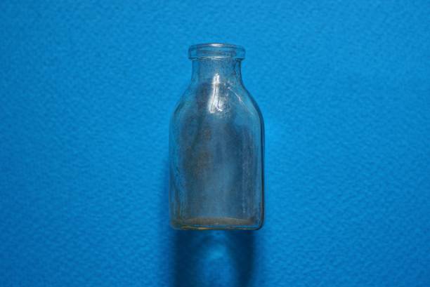 istock one small gray dirty glass bottle 1334697160