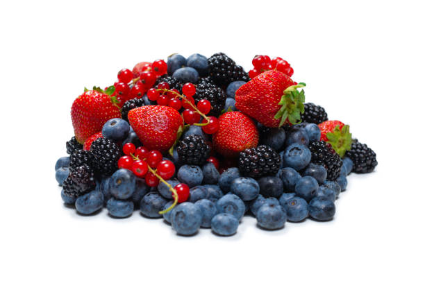 istock Blackberry, raspberry, blueberry,  red currant and mint background. 1334697320