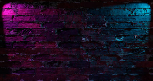 istock 3d rendering. Brick wall illuminated by neon pink light from spotlights. Abstract background Light effect on a serving surface. 1334706493