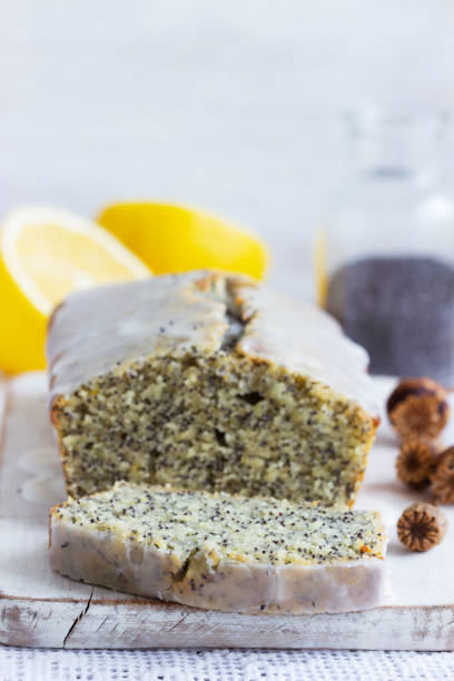 istock Lemon cake with poppy seeds, covered with glaze on a light background. 1334706564