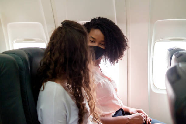 istock Two young women flying 1334709148