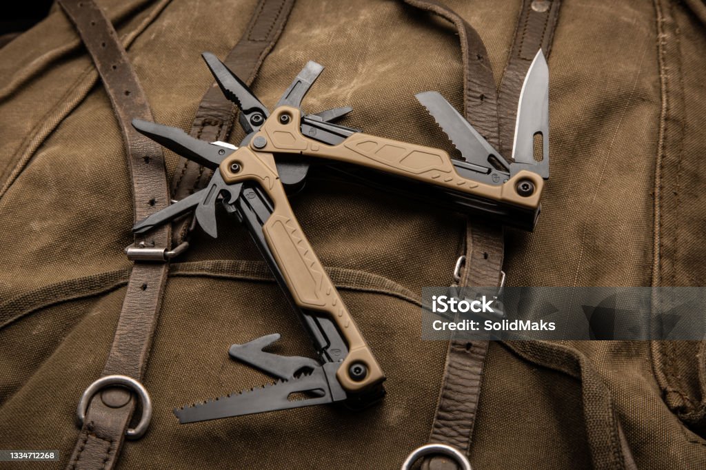 Back Pack Multi Tool Modern Multitool With Many Tools A Portable Multitasking Tool On A ...