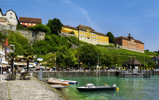 Meersburg, Germany, July 5, 2015: The view of the port of the picturesque medieval town of Meersburg which is situated on the north bank of the Lake Constance. The town is a popular travel destination.