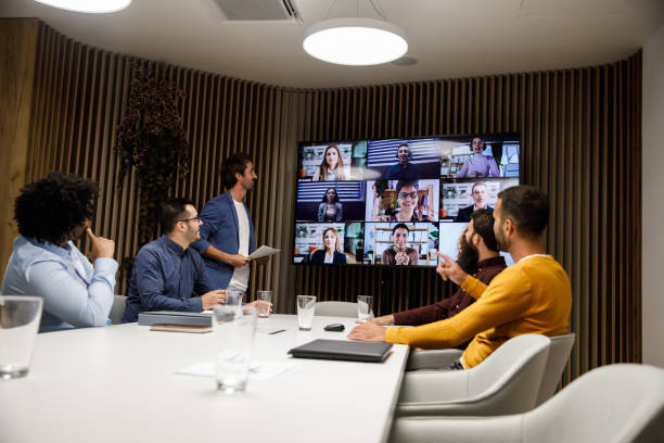 istock Discussing project ideas with coworkers via video call 1334716818