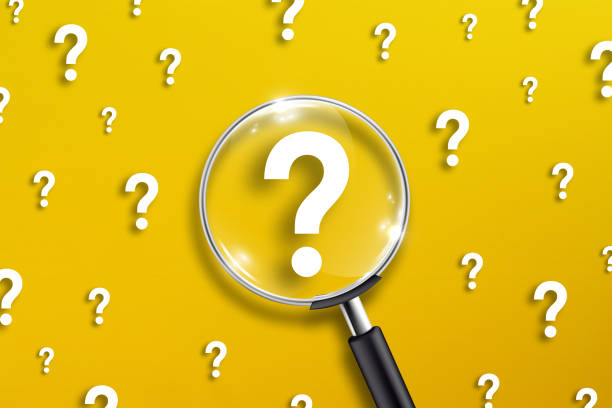 istock Magnifying glass and question mark on yellow background 1334719225