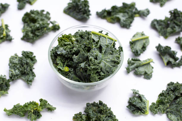 istock Kale leaves on white background. 1334724479