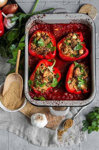 Cooking red paprika stuffed with the minced meat