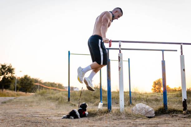 istock Young man exercising with his dog 1334728206