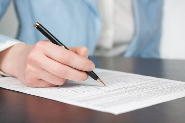 istock Business woman signing contract 1334728292