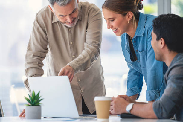 istock Group of business people working and smiling. 1334729684