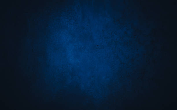 istock Dark blue textured concrete background with center light spot . Abstract texture for graphic design or wallpaper 1334733501