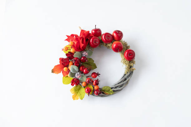 istock red apple and Rose hips wreath 1334745357