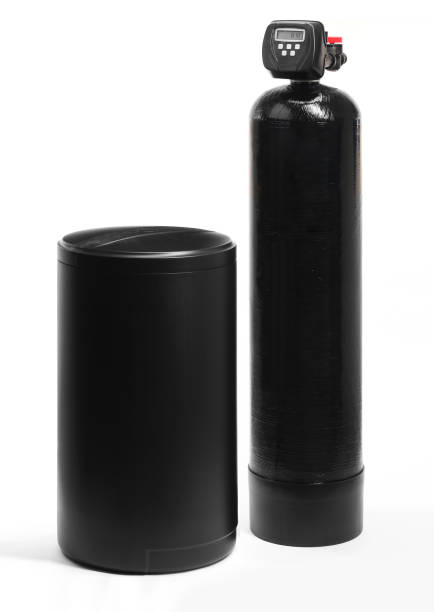 A water softener and brine tank on white