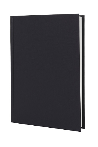 A black hardcover book upright on white with clipping path