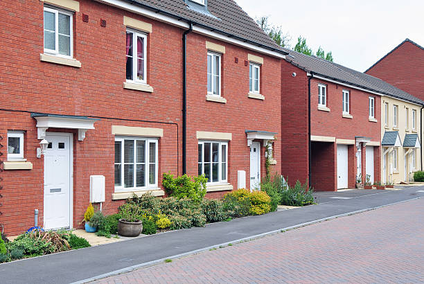 New Terraced Houses New Terraced Houses on a Typical English Residential Estate house uk row house london england stock pictures, royalty-free photos & images