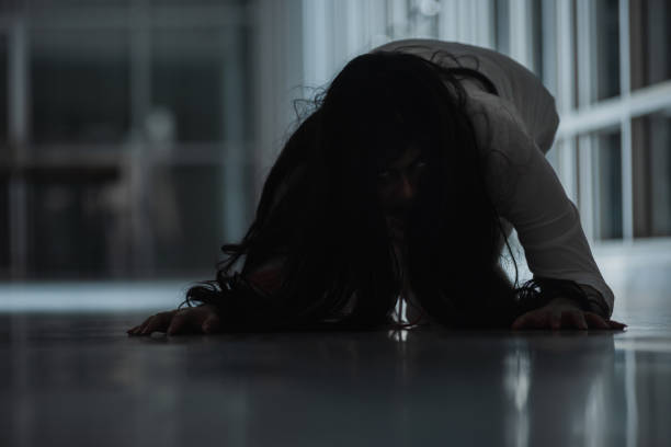 istock Horror evil woman ghost creepy crawling 1334756828