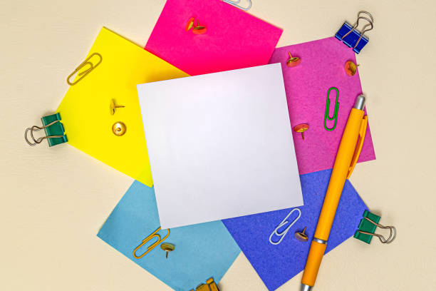 istock Multiple Assorted Collection Office Stationery Photo With Pens Pencils Notepads Notebook Ruler Stapler Scissors Clippers Paper Clips Holders Clipboard Placed Over Table 1334768428