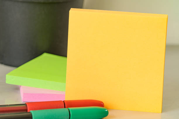 istock Multiple Assorted Collection Office Stationery Photo With Pens Pencils Notepads Notebook Ruler Stapler Scissors Clippers Paper Clips Holders Clipboard Placed Over Table 1334768621