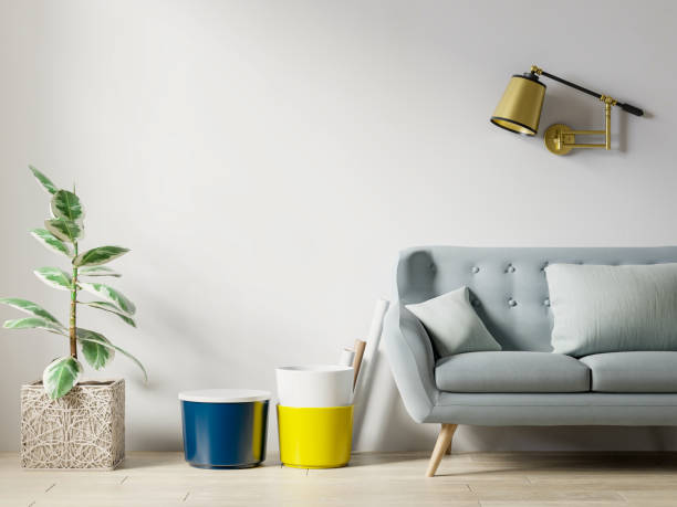 istock Living Room interior wall mockup with sofa and pillows on white background. 1334772868